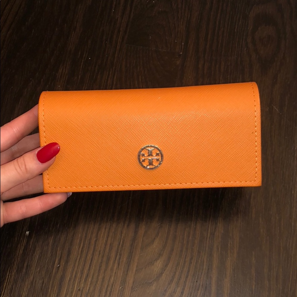 Orange Tory Burch sunglasses case